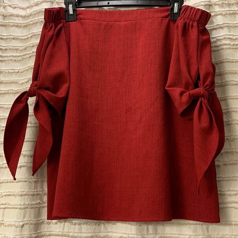 Red off the shoulder top with bow tie mid sleeves!